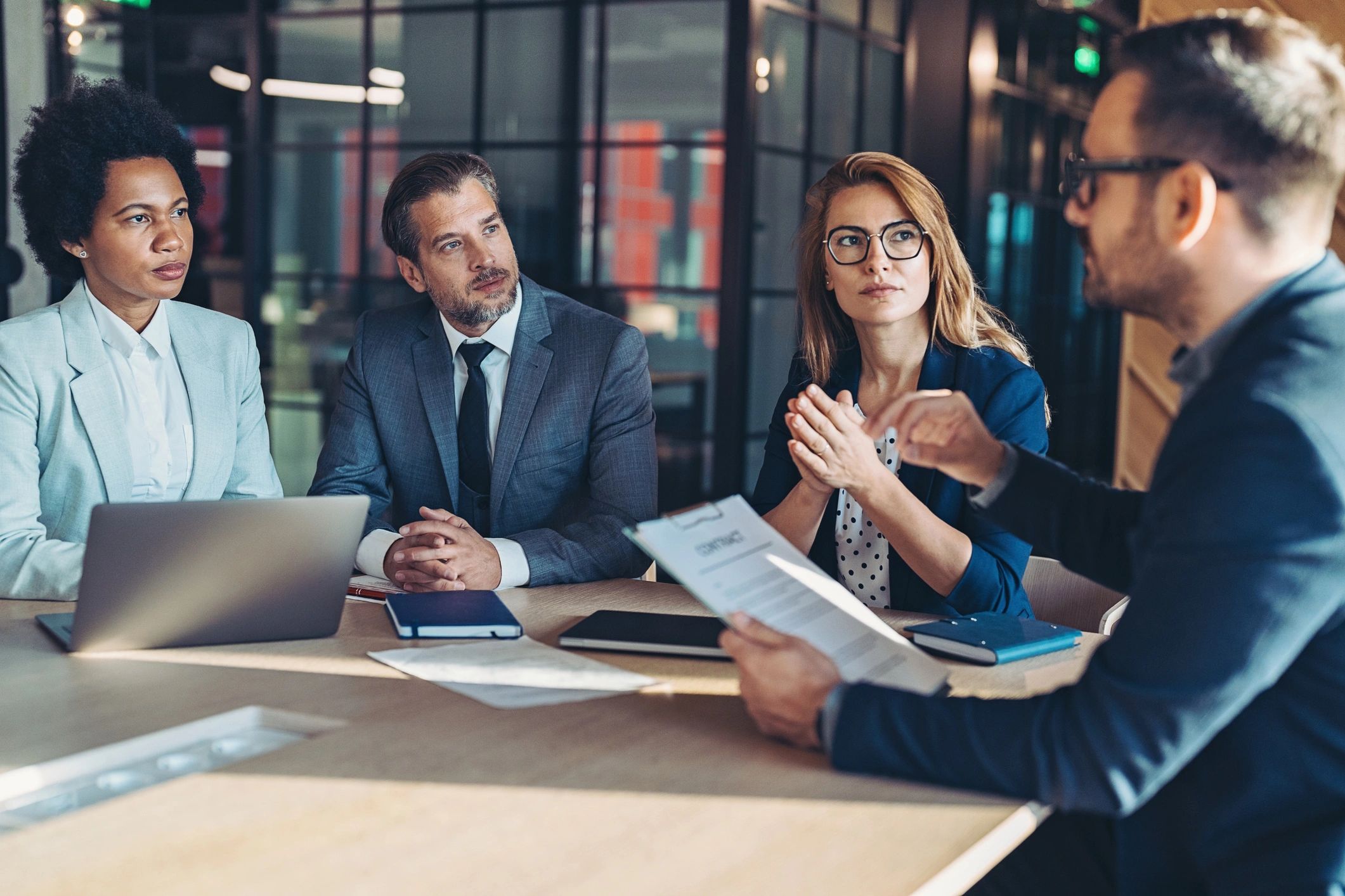Business meeting focused on compliance and planning