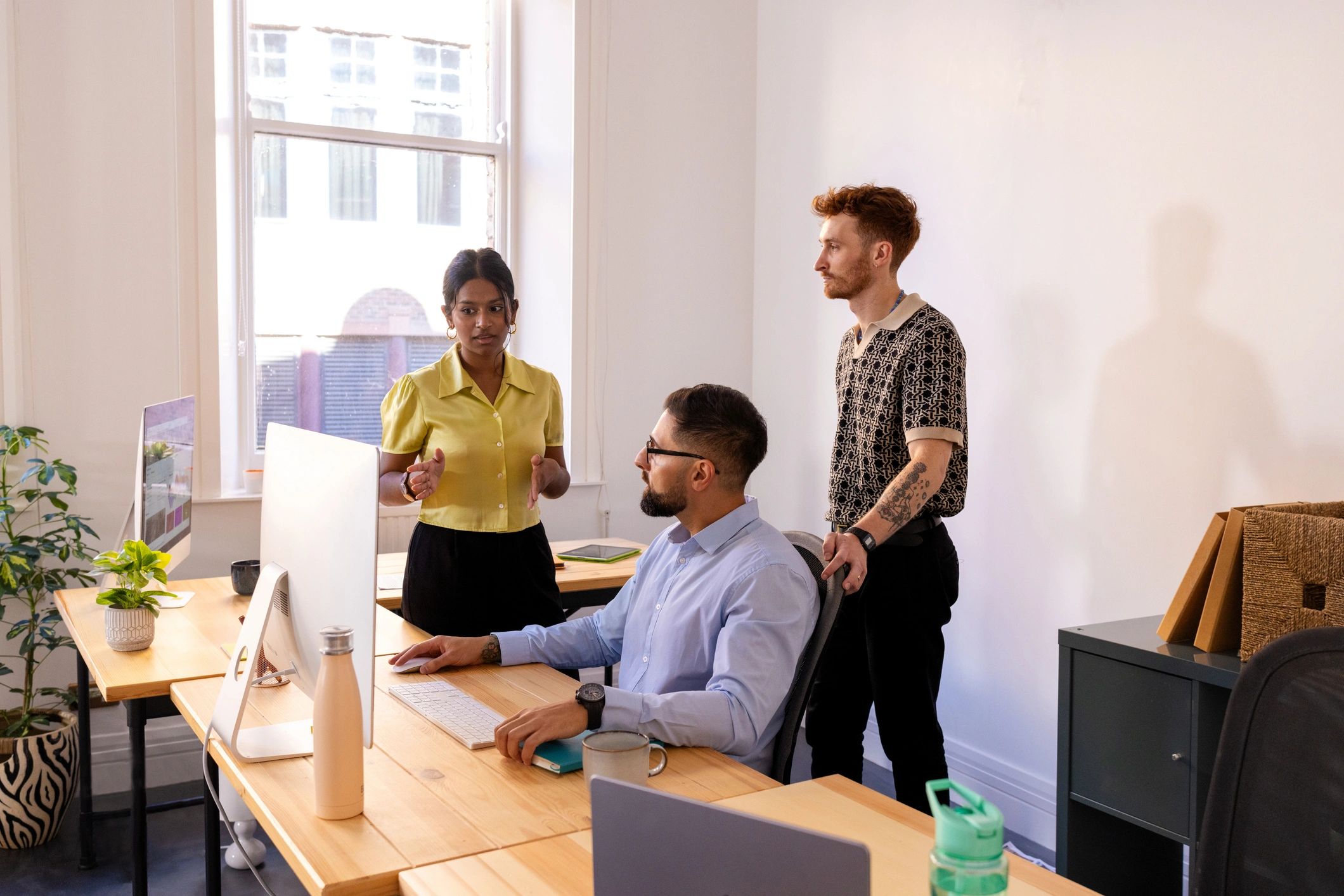 Professional team collaborating in a modern office
